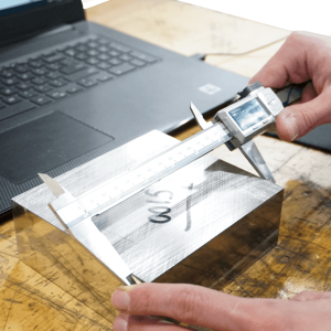 Tool Steel Inspected with Calipers